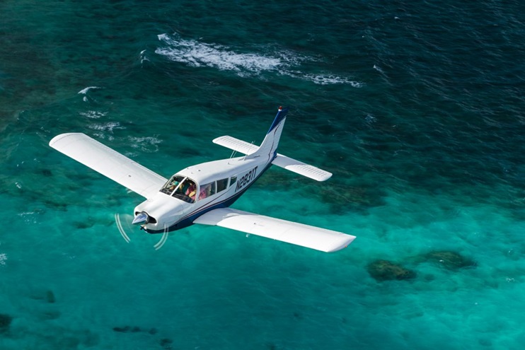 Aerial photography of Joe Goodin's Piper Arrow flying around Cat Island of the Bahamas. Fernandez Bay Cat Island Bahamas