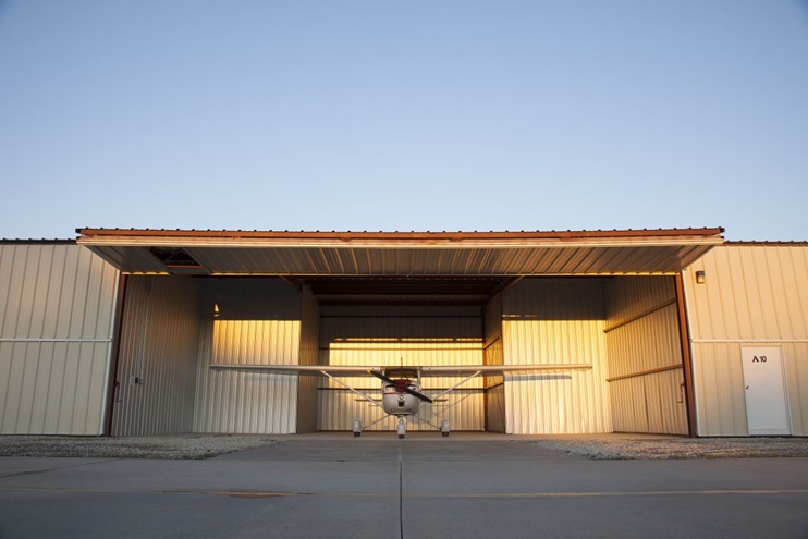 Photography of a Cessna 150 in a hangar at sunset.

Benton, KS  USA