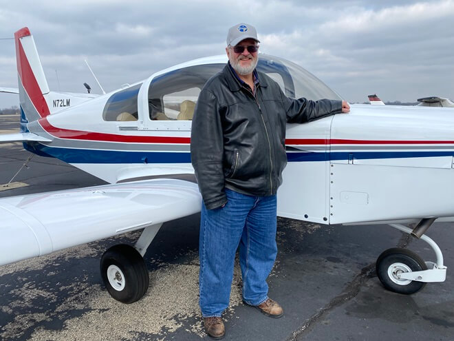 Paul Coonan with his 1972 Grumman Traveler