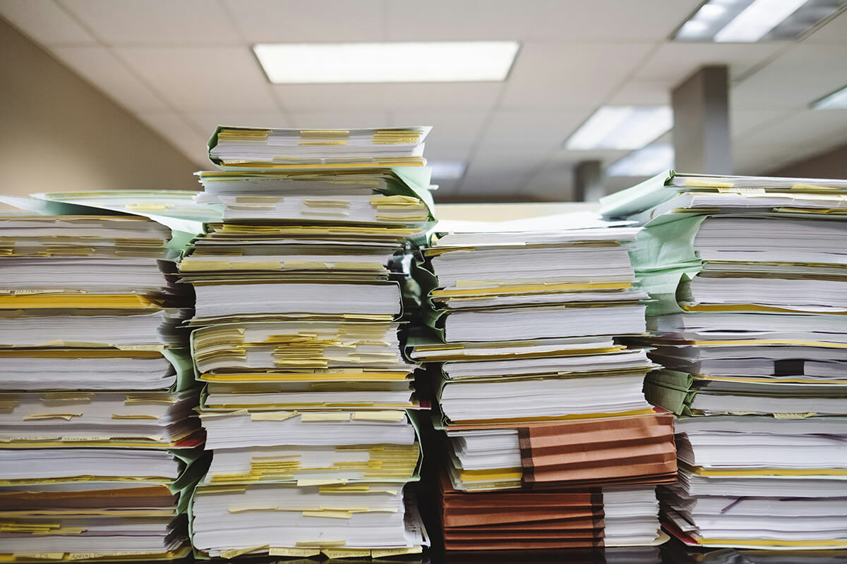 A large stack of documentation.
